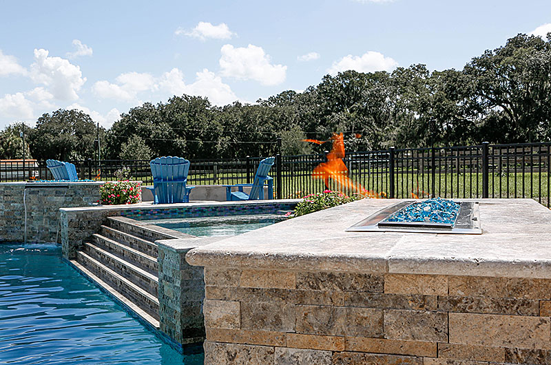 Wildcat Fire Glass in a fire pit near a pool